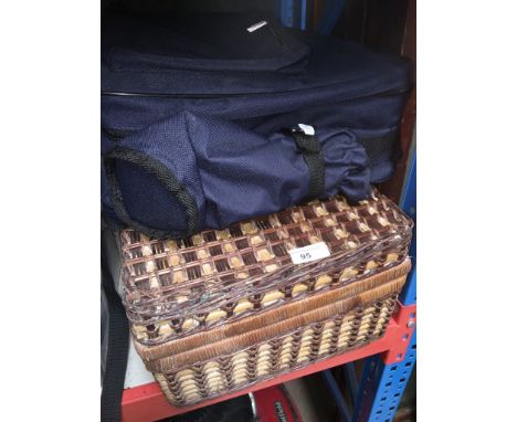 A fitted picnic hamper and a picnic case / rucksack. 