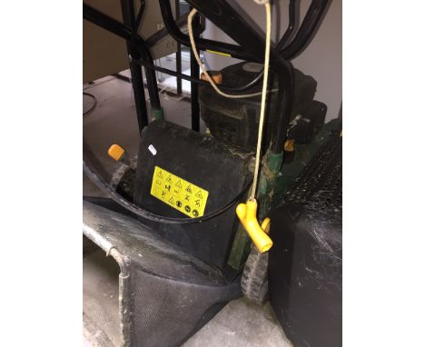 A Rotary petrol lawn mower 