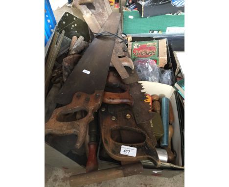 2 boxes of tools, large wood saws, etc.