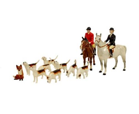 Beswick Hunting Group Comprising: Huntswoman - Style Two: Standing, model No. 1730, grey gloss and Huntsman - Style Two: Stan