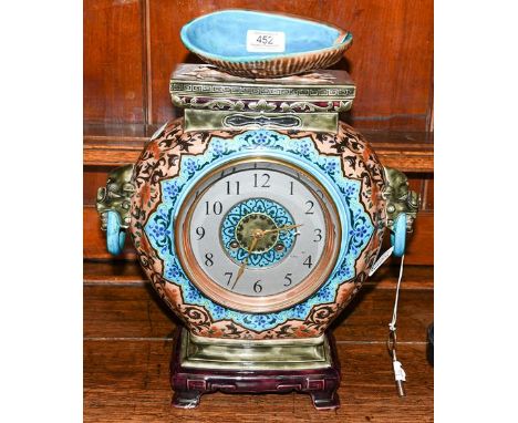 A French faience Aesthetic movement striking mantle clock, circa 1880, possibly by Jules Vieillard, the case with foliate and