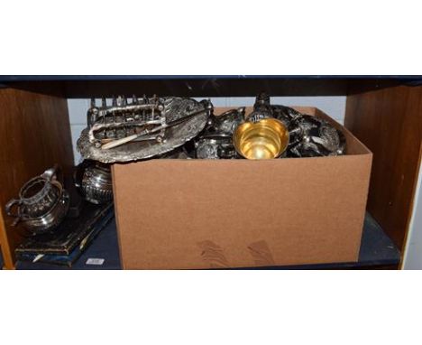 ~A large quantity of silver plate including three and four-piece tea sets, sugar caster, etc (one shelf)
