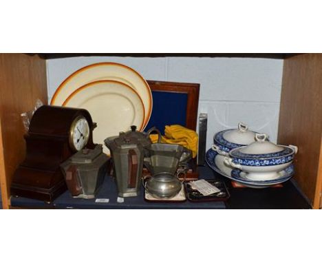 A shelf of assorted pewter, silver coffee bean spoons, cased mother-of-pearl handled fish knives and forks, Clarice Cliffe, d