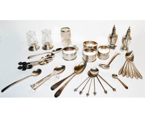 ~A tray of silver including a caddy spoon by Arthur Creighton, Sheffield 1969, a pair of Victorian pepperettes, napkin rings,
