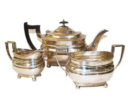 ~A George V silver three piece tea service by William Hutton &amp; Sons Ltd., marked for Sheffield 1935, gross weight 1092 gr