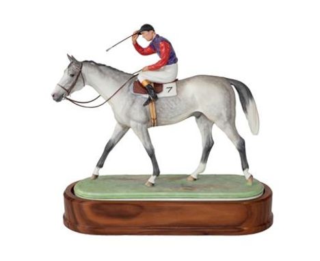 Royal Worcester 'The Winner', model No. RW3671 by Doris Lindner, on wooden plinth (a.f).  Possible area of re-spraying to red