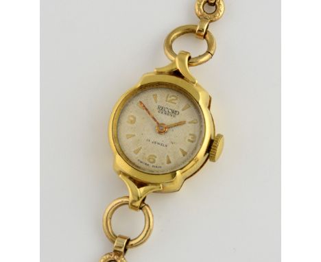 Record Watch Company ladies octagonal gold cased watch, the signed dial with alternating batons and numerals and gilt hands, 
