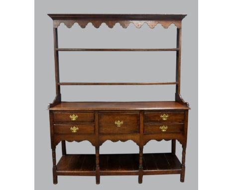 18th century oak dresser, with two tier plate rack above base with five drawers and a pot shelf, 190cm x 155cm .    