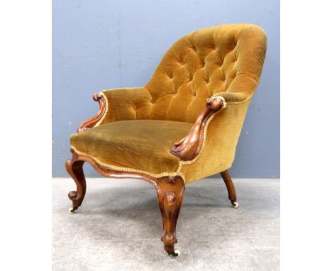 19th century mahogany frame button back arm chair on cabriole legs.    