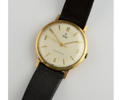 Tudor Gold dress watch, satin dial with batons and Arabic numerals at 12,3,6 and 9, gold hands and centre seconds, the polish