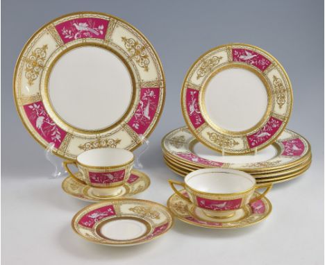 Set of 6 Minton plates the borders decorated with alternate pate sur pate panels of birds on a cerise ground with gilded flor