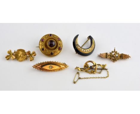 Five brooches, French brooch with central portrait panel surrounded by two clover leaves, in yellow metal testing as 18 ct, a