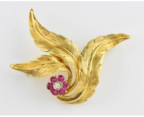 Vintage ruby and diamond brooch, stones set in floral cluster, mounted amongst three textured leaves set, in 18 ct yellow gol