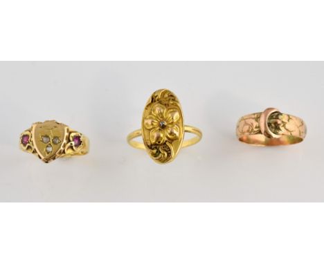Gold rings, an Art Nouveau plaque ring with small diamond, in unmarked gold testing as 18 ct, size O half, a Victorian shield