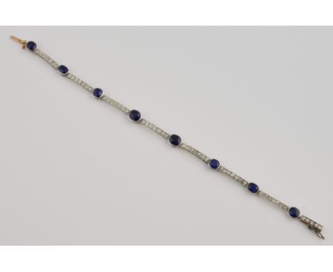 Edwardian sapphire and diamond bracelet, eight oval cut sapphires, estimated total weight 5.00 carats, seven old cut diamond 