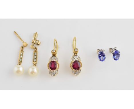 Three pairs of earrings, ruby and diamond drop earrings, mounted in yellow metal stamped 18 ct, with oval cut tanzanite stud 
