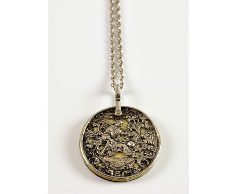 Victorian dance card pendant, containing four round ivory dance cards, enclosed in silver case decorated with scrolling patte