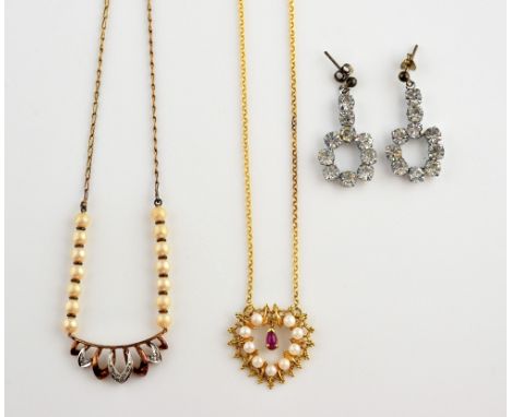 Ruby and pearl pendant, mounted in yellow metal stamped 9ct, chain measuring approximately 50cm in length, with a faux pearl 