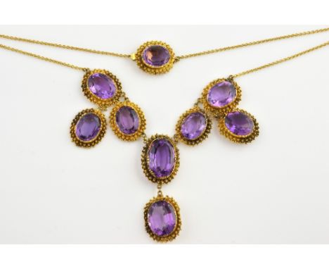 Victorian amethyst necklace, nine oval cut amethysts, estimated total weight 48.73 carats, set in textured border, in yellow 