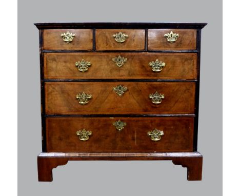 18th century walnut three chest of three short and three long drawers with inlaid banding, centre top drawer with secret comp