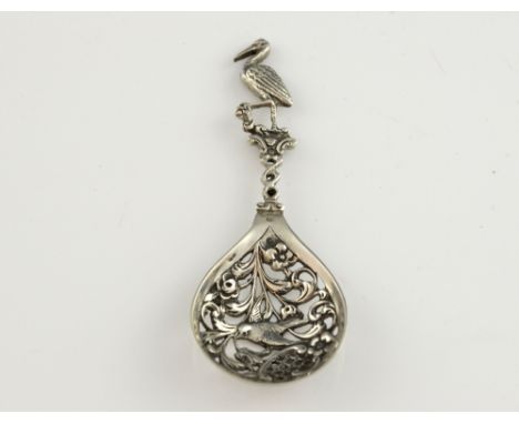 19th century Dutch silver caddy spoon, with pierced bowl depicting a bird and foliage, with stork finial, 9.5 cm long, 15 g..