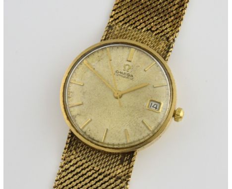 Omega gentleman's gold round cased watch the champagne dial with Omega logo and markers, date aperture at 3, gold hands and c