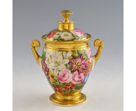 19th Century continental porcelain two handled jar and cover, decorated with flowers and with gilt borders, 25 cm high.    Ru