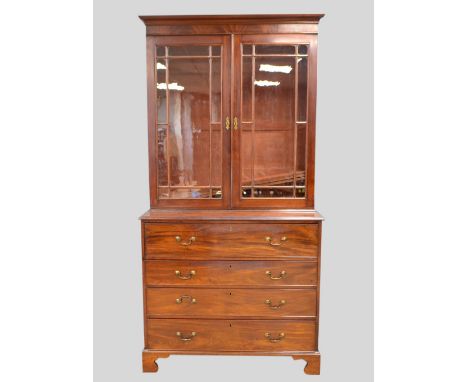 19th century mahogany secretaire bookcase, two glazed doors over secretaire drawer enclosing central cupboard flanked by pige