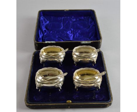 Edward VII silver set of four open salts, by William Hutton & Sons, Sheffield 1909 and 1911, two with gilt interiors, each on