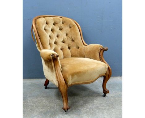 Victorian mahogany and upholstered button back armchair with scroll arm supports on cabriole legs with scroll feet, 93 cms.  