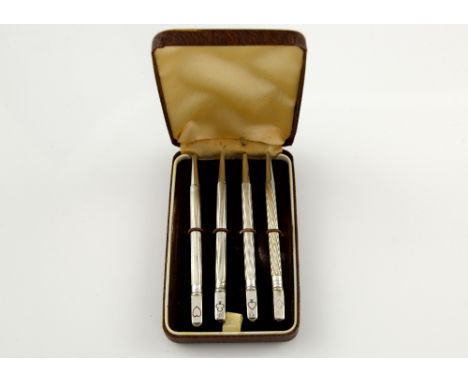 Elizabeth II sterling silver bridge pencils, with engine turned stems and enamelled terminals, in fitted case, 9 cm long.    