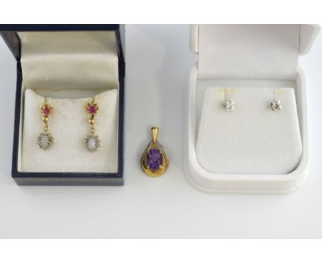 A pair of diamond ear studs estimated total weight 0.20 carat, unmarked white metal, two other pairs opal and ruby set, and a