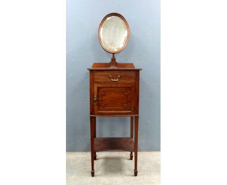 Early 20th century  gentleman's mahogany dressing stand with oval tilt mirror over drawer, pot cupboard and shelf, 135cm. Pro