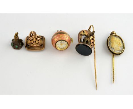 Mixed group of items, two blood stone fobs, articulated horse and horse shoe stick pin, with a articulated cameo stick pin, a