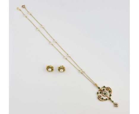 Edwardian style emerald and pearl set pendant gold on a gold chain with pearls, measuring 40cm in length and similar stud ear