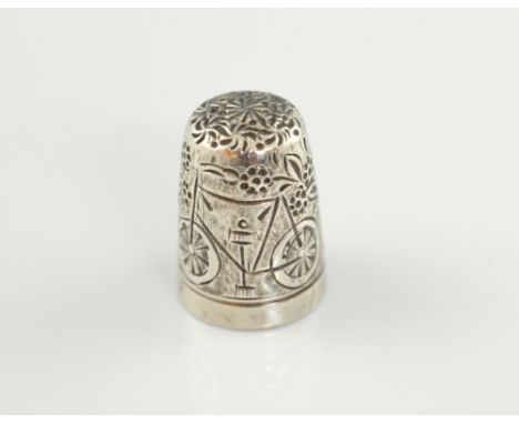 Rare Victorian silver thimble, the bicycle with broad un-dotted tyres amongst leafy flowers and with a bird, by James Fenton,