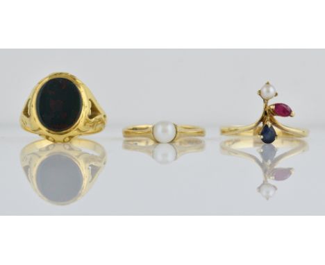 Three gold rings, bloodstone set signet ring, ( unmarked) Pearl ruby and sapphire ring, stamped 585 for 14 ct and a single pe