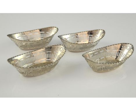 George V set of four silver bonbon dishes, with pierced galleries, by William Hutton & Sons, Birmingham 1911, 11.5 cm wide, 4