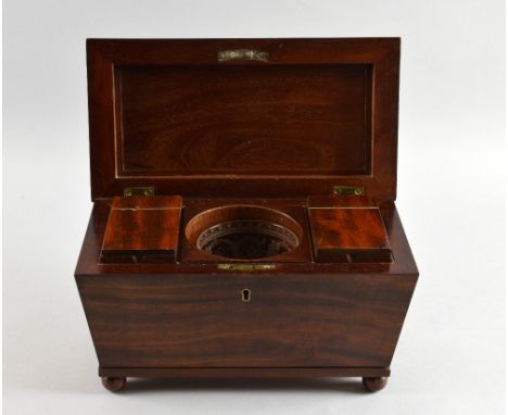 19th century mahogany sarcophagus shaped tea caddy, with two interior covered caddies and a glass bowl, on ball feet, 32cm wi