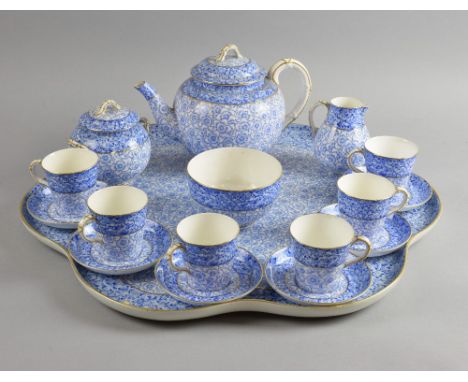 Royal Worcester late 19th century, blue and white floral patterned tea service and scalloped tray, with gilt rim, blue factor