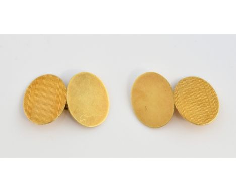 Vintage cufflinks, engine turned oval and plain oval attached by chain links, 18ct yellow gold, hallmarked Chester 1956, make