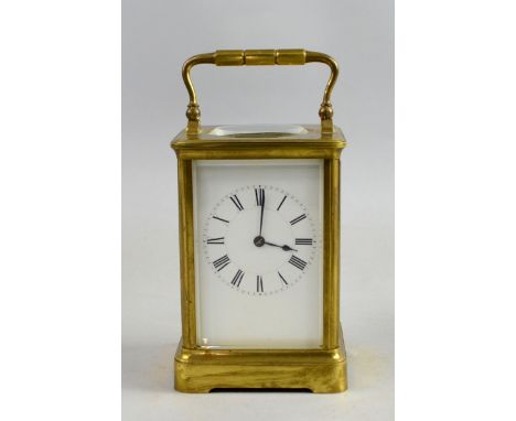 French brass carriage clock the eight day movement striking the hours and half hours on a gong. 18.5cm.    No 5539 on back pl