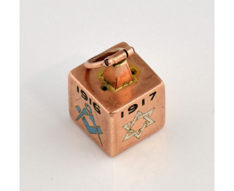 Masonic cube fob with enamelled decoration and dates 1916-1918, hallmarked Birmingham 1919, in 9 ct rose gold.     Gross weig