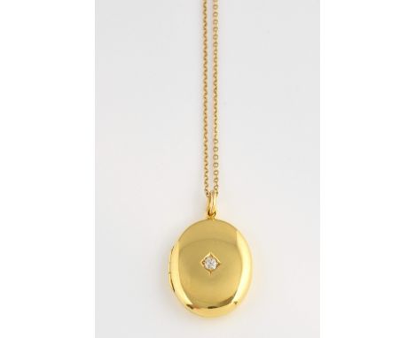 Old cut diamond set locket, oval locket, measuring 3.3 x 2cm, hallmarked Birmingham 1915, in 18 ct gold, with oval link chain