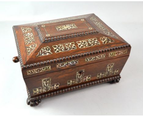 19th century rosewood and mother of pearl inlaid sewing box the fitted interior with ivory accessories. 15cm high x 30cm wide