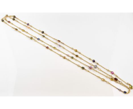 Long spectacle set gemstone chain, including white sapphire, star ruby, star sapphire, almandine garnet, peridot, amethyst, c