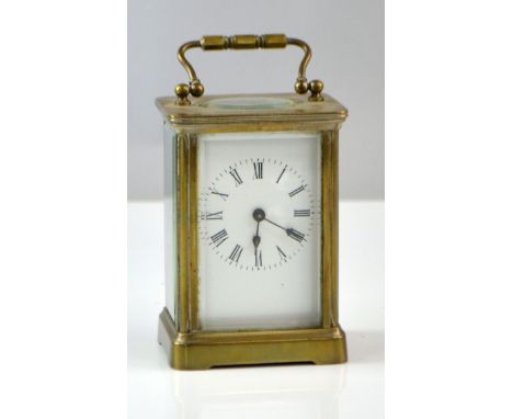 Early 20th century brass and glass carriage clock , 15cm .    