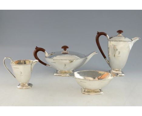 George V silver Art Deco  four piece tea service of shaped oval form comprising teapot, hot water jug, sugar basin and cream 