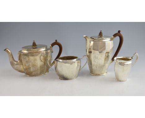 George VI four piece silver tea service, comprising teapot, hot water jug, cream jug and sugar bowl, by Stower & Wragg Ltd., 