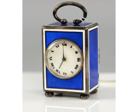 Swiss silver and enamel cased miniature carriage timepiece, blue enamel ground with white border, loop handle and flattened b